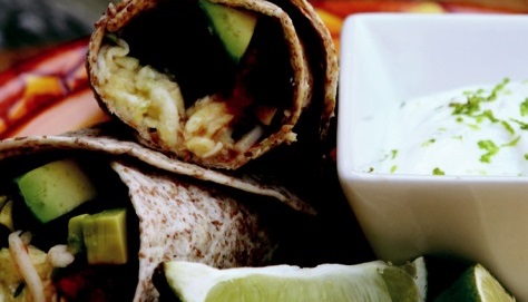 BLACK BEAN AND AVOCADO BREAKFAST BURRITO WITH LIME CREAM